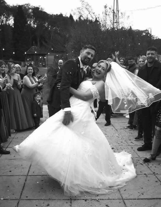 Black and white wedding celebration moment